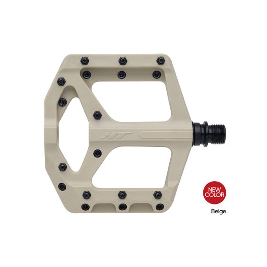 The HT Components Supreme C PA32A Pedals are beige flat pedals made from nylon-reinforced composite, featuring multiple replaceable grip pins and a black spindle—a new super grippy color option.