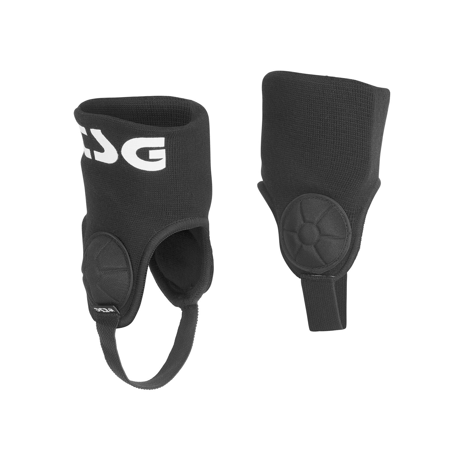 The TSG Ankle Guard Cam is a pair of black ankle braces with white lettering, EVA foam padded circular sections, foot straps, and an open heel design for superior protection, shown on a white background.