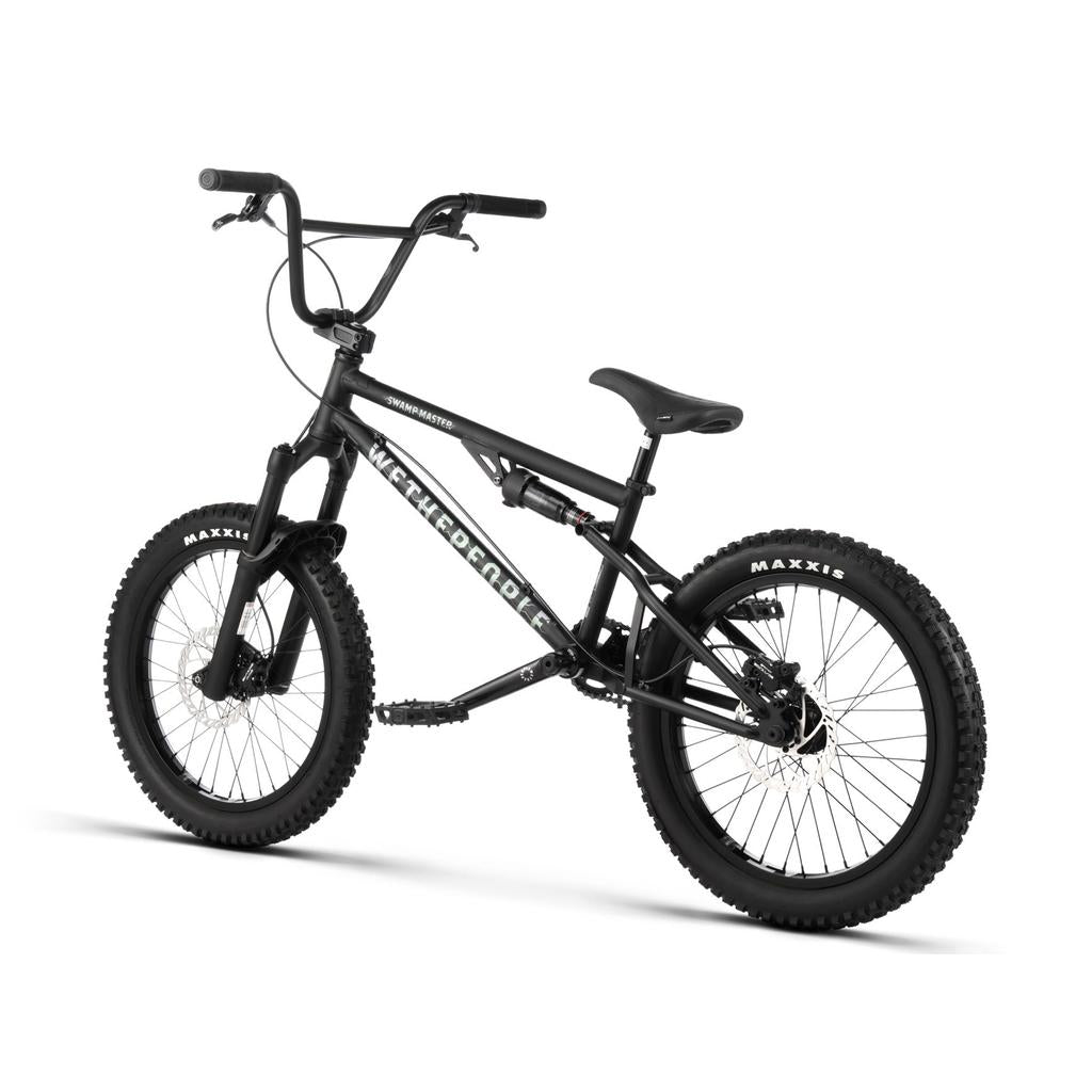 Black Wethepeople Swampmaster 20 Inch Bike with front and rear disc brakes, knobby tires, and full-suspension.