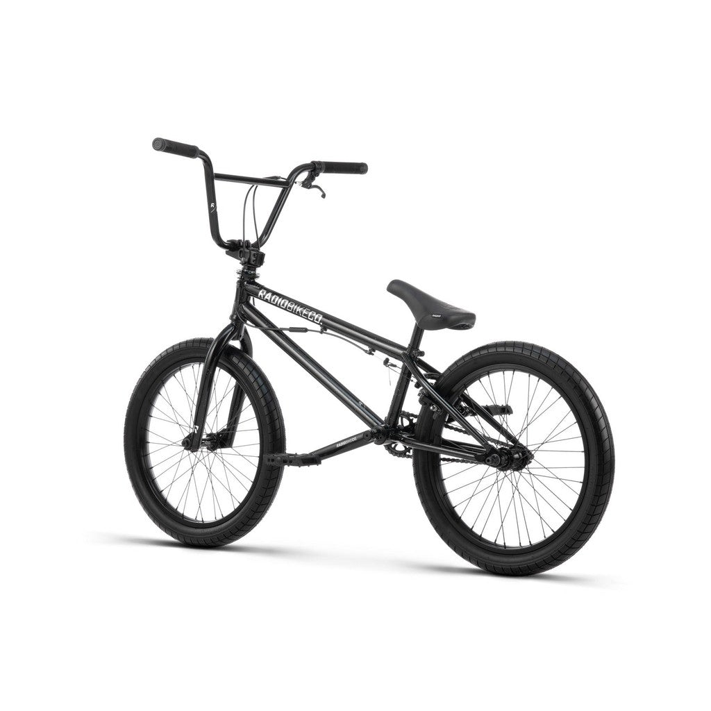 The Radio Astron FS 20 Inch Bike is a black BMX bike with a full chromoly frame, wide handlebars, and thick tires, designed for trick riding and stunts. It also features Radio Pro Hubs for exceptional performance.