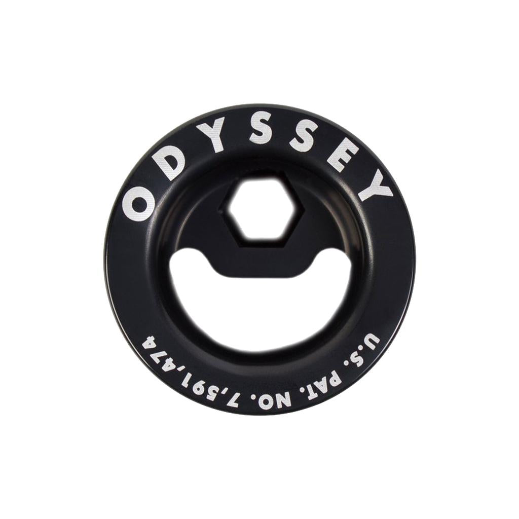 Black metal bottle opener with "ODYSSEY" and "U.S. PAT. NO. 7,591,474"; features large and small center openings—ideal for fans of the Odyssey RF Series Preload Fork Bolt (24x1.5mm thread).