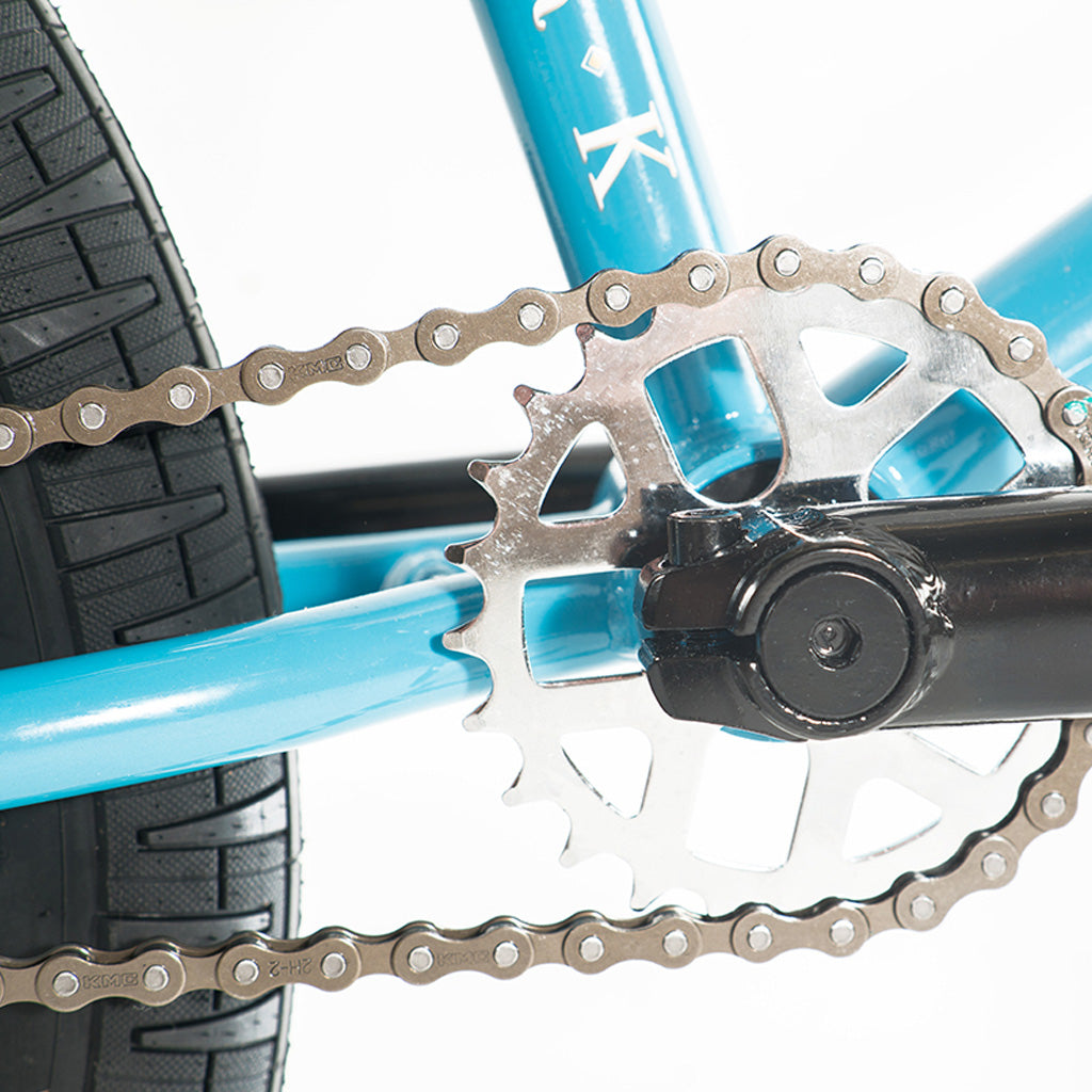 A close up of a Division Reark 20 Inch Bike with a chain on it, featuring 3-piece cranks.