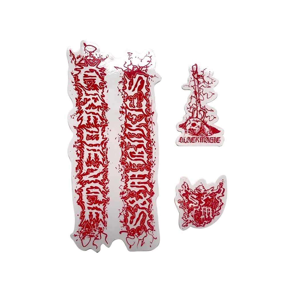 The S&M Black Magic V1 Frame Decal Set includes three sweet decals with intricate red and white designs, featuring abstract letterforms and a stylized guitar with flames.