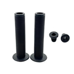 Two black DRS Mushroom Grips with flanges and matching bar end plugs are shown on a white background.