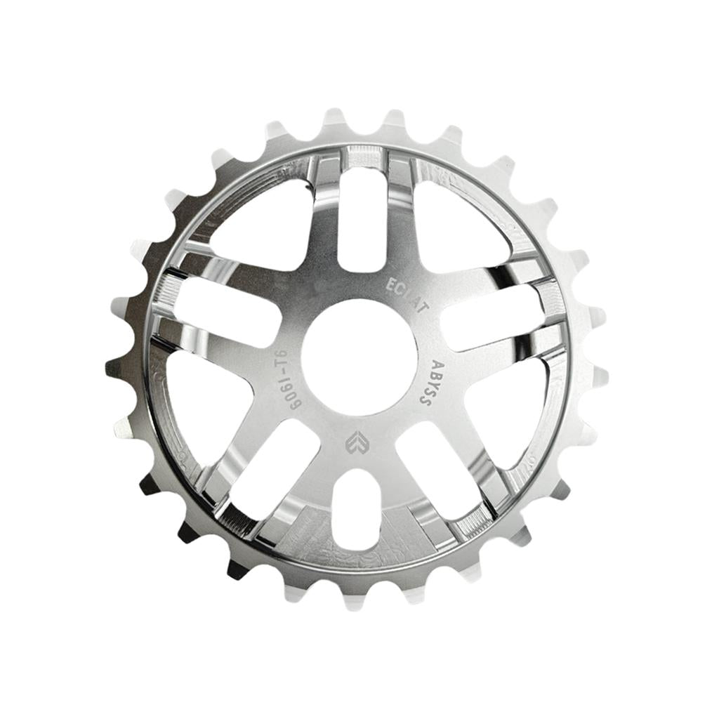 The Eclat Abyss Sprocket is a silver BMX sprocket with 16 teeth and eight elongated slots, made from strong 6061-T6 alloy, shown from above on a white background.
