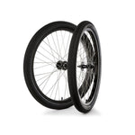 The S&M Covid 26 Inch Wheel Set features two black bicycle wheels with spokes and double wall 26" rims, shown upright side-by-side against a white background.