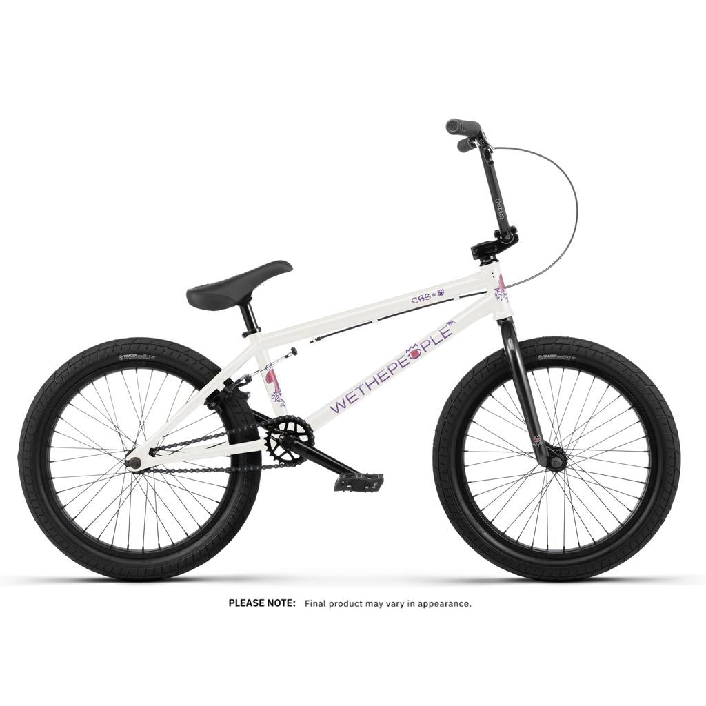 The Wethepeople CRS 20 Inch Bike features a white frame with black wheels, a black seat, and bold "WETHEPEOPLE" branding—perfect for freestyle BMX. Shown in a side view against a plain background.