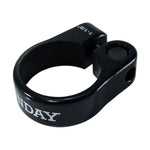 A Sunday Slim Seat Clamp with "SUNDAY" inscribed on the side features an ultra-slim aluminum design and a durable chromoly bolt for tightening.