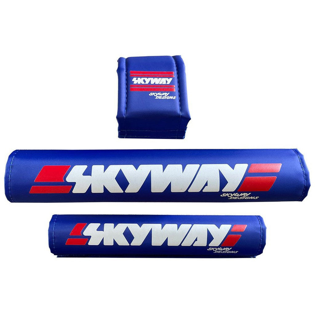 A set of blue, white and red SKYWAY USA Made Retro Pad Set with the Skyway logo on them, proudly made in the USA.