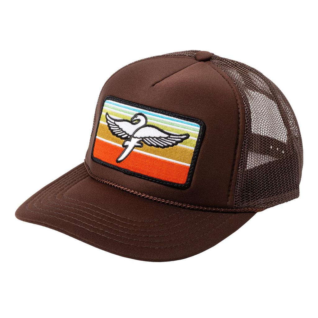 The Fairdale Swan Cap is a brown trucker mesh hat featuring a vibrant patch of a white swan with outstretched wings on colorful horizontal stripes.