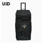 The Albek Meridian Wheeled Gear Bag is black with wheels, a telescoping handle, multiple zippered compartments, a waterproof lining, and features "WE ARE LUSTY" plus a yellow lightning bolt on the front pocket.