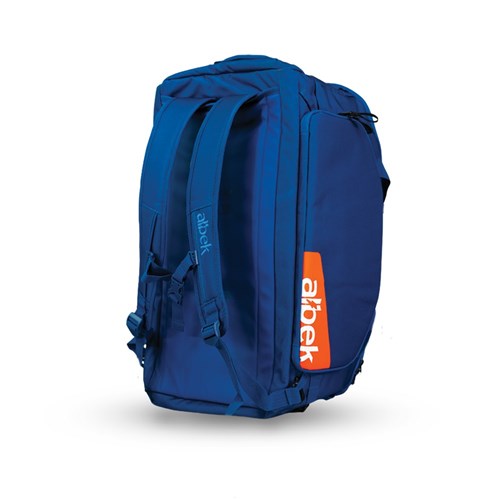 The Albek Skytrail 51 Gear Bag—a blue duffel backpack with adjustable straps, side handle, vivid orange "abek" logo, and padded helmet compartment—stands upright on a white background, ideal for adventure travel.