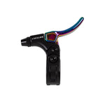 An Odyssey Monolever Short Lever BMX brake lever in black and rainbow colors with a hinged clamp is shown against a white background.