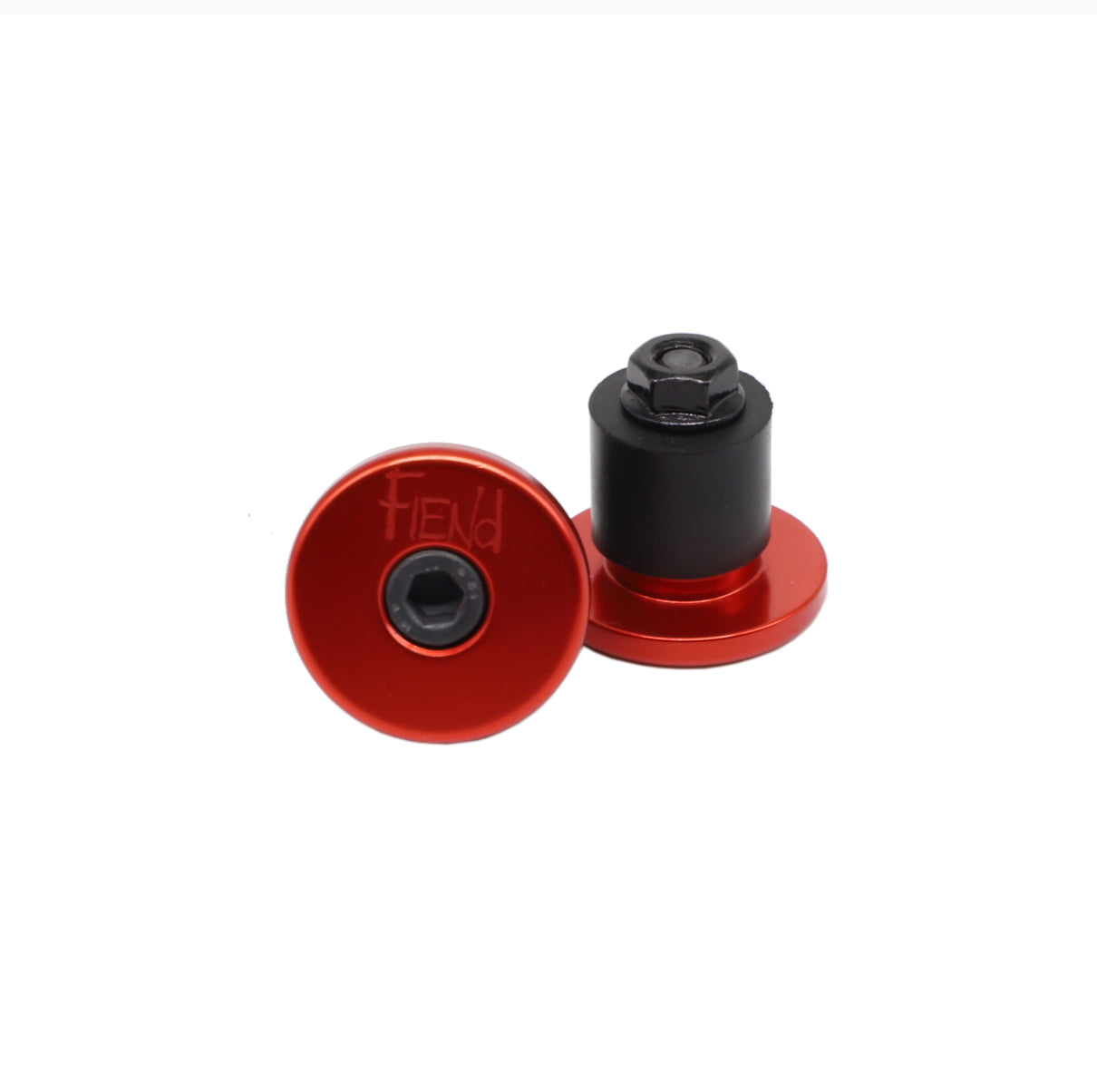 Two Fiend Alloy Bar Ends in red and black metal are displayed—one upright and one flat—each featuring a hex bolt center and “FIEND” engraved on the red cap, designed to provide durable protection for your bike’s handlebars.