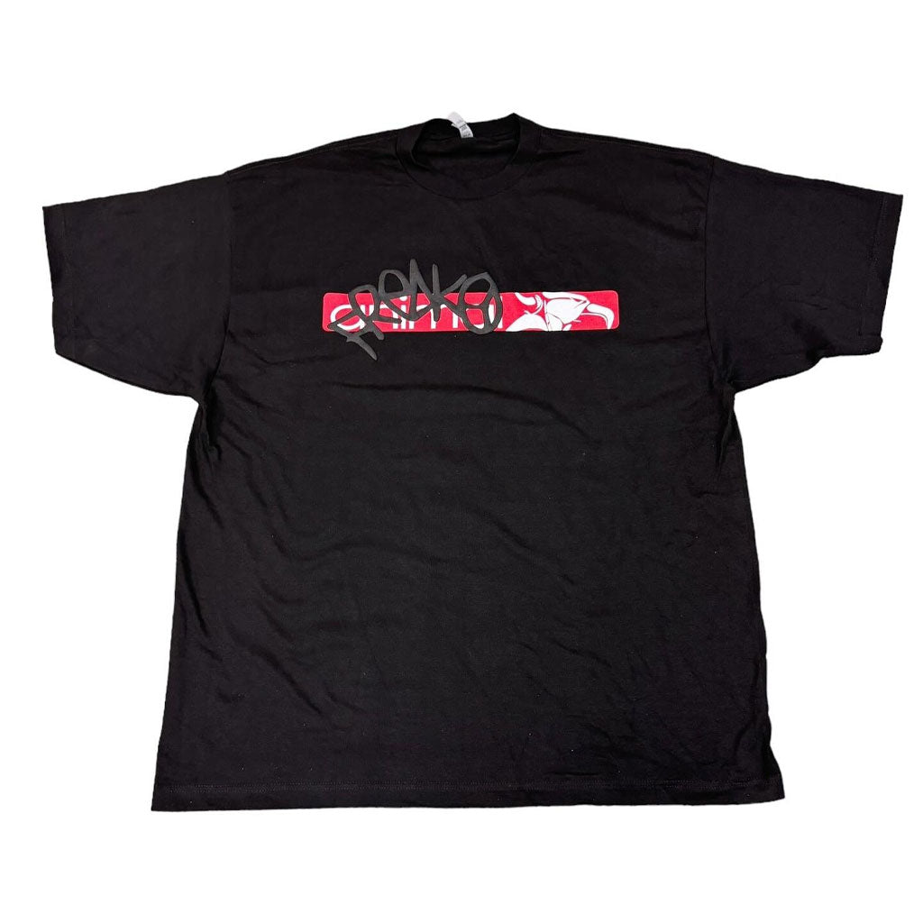 Black Animal SLAPZ Tee with a rectangular red and white logo featuring the word "Supreme" in gray graffiti-style text on the chest, designed by Atlanta-based illustrator Freako Rico as part of a limited line.