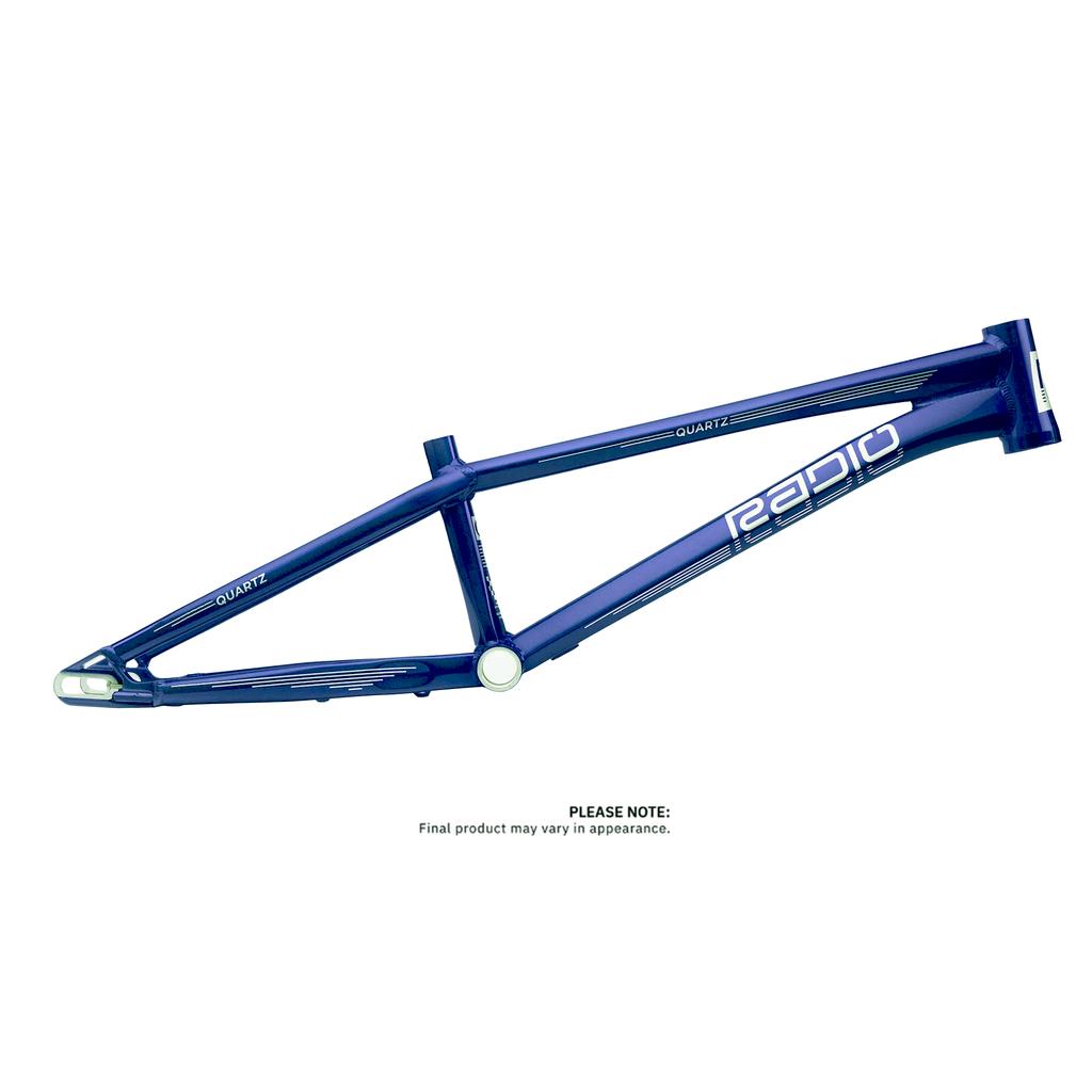 The Radio Raceline Quartz Disc Pro XXXL Frame is a blue bicycle frame with "Rapid" and "Quartz" labels, featuring a lightweight alloy design. Please note: Final product appearance may vary.