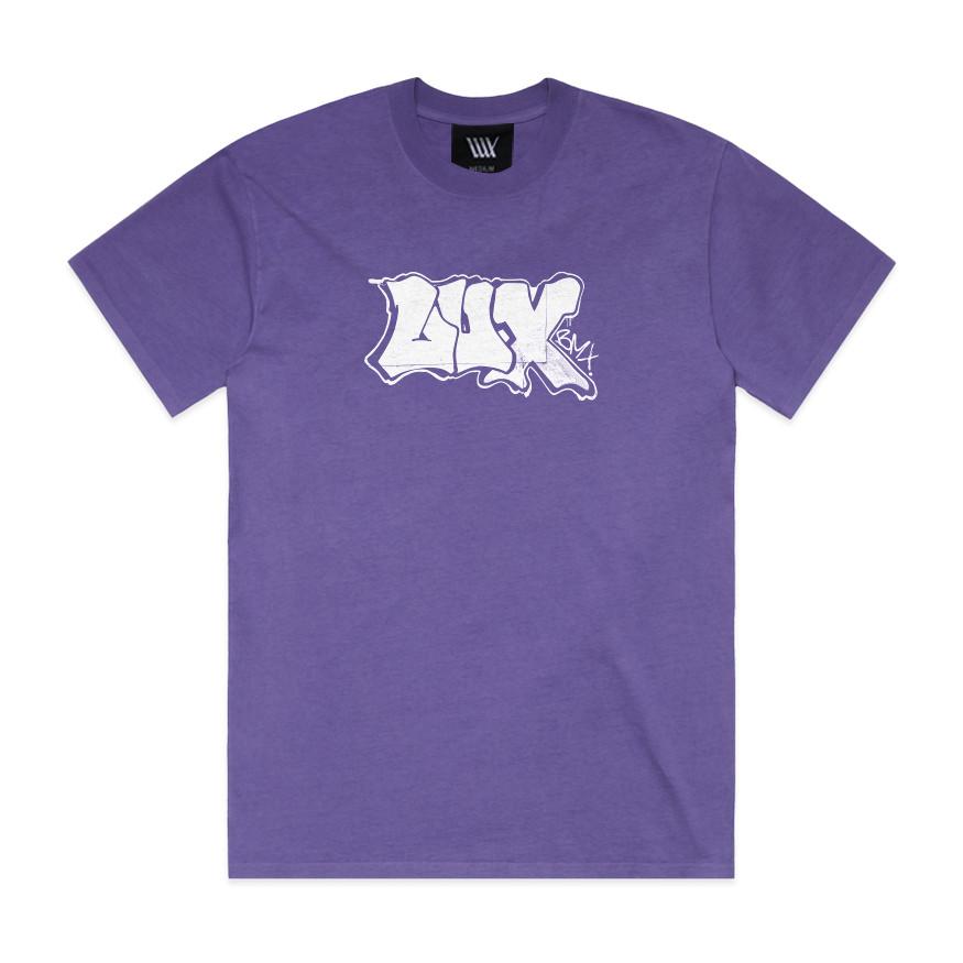 LUXBMX Appleton Tee Faded Violet, a heavyweight cotton t-shirt in purple with white graffiti-style "LUX" text on the front, inspired by Jack Appleton’s signature graffiti t-shirt designs, shown against a white background.