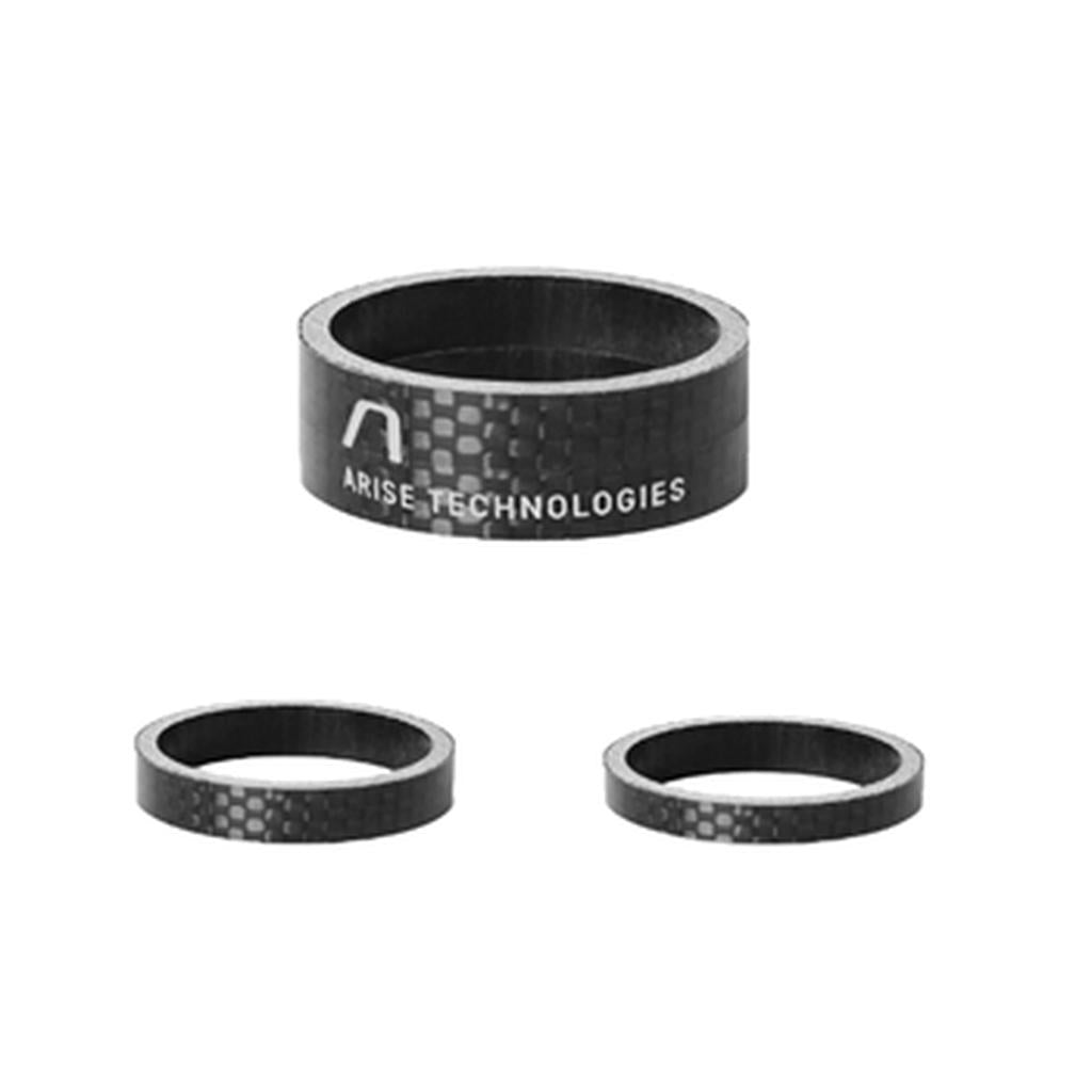 Three Arise Carbon Fibre Headset 1-1/8th Inch spacers with "ARISE TECHNOLOGIES" branding, arranged with one above two others on a white background.