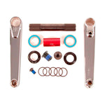 Fit Blunt Cranks with heat-treated chromoly construction, hollow 24mm spindle, bearings, spacers, and hardware are neatly arranged on a white background.