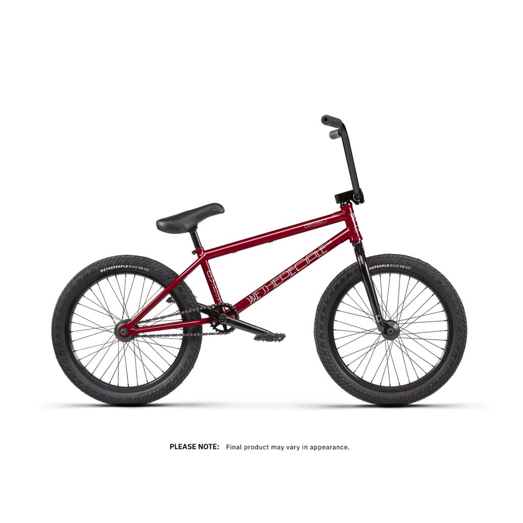 A Wethepeople Crysis 20 Inch Bike in red with black handlebars, seat, and tires is shown on a white background. Text below states the final product may look different.