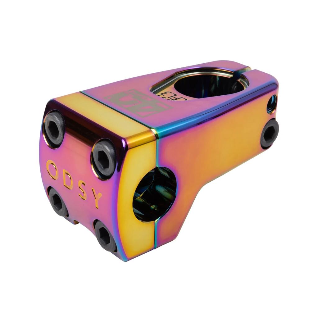The limited-edition Odyssey CFL3 40th Anniversary Front Load Stem features an iridescent, multi-color finish and "ODSY" lettering. With multiple screw holes for easy attachment, this BMX stem commemorates 40 years and is a must-have for enthusiasts.
