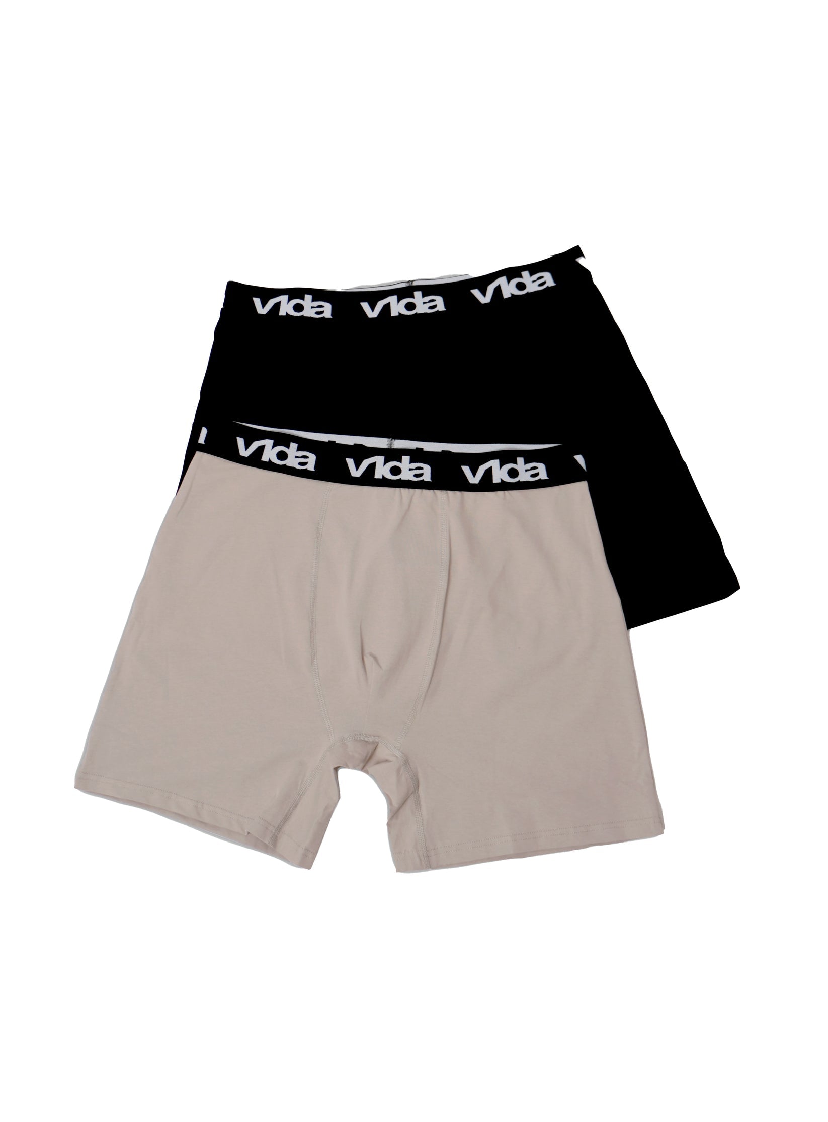 The V1da Boxer Briefs (2 Pack) includes one black and one beige men's mid-length cotton boxer, both with updated design and black elastic waistbands featuring the white "Vida" logo, displayed on a white background.