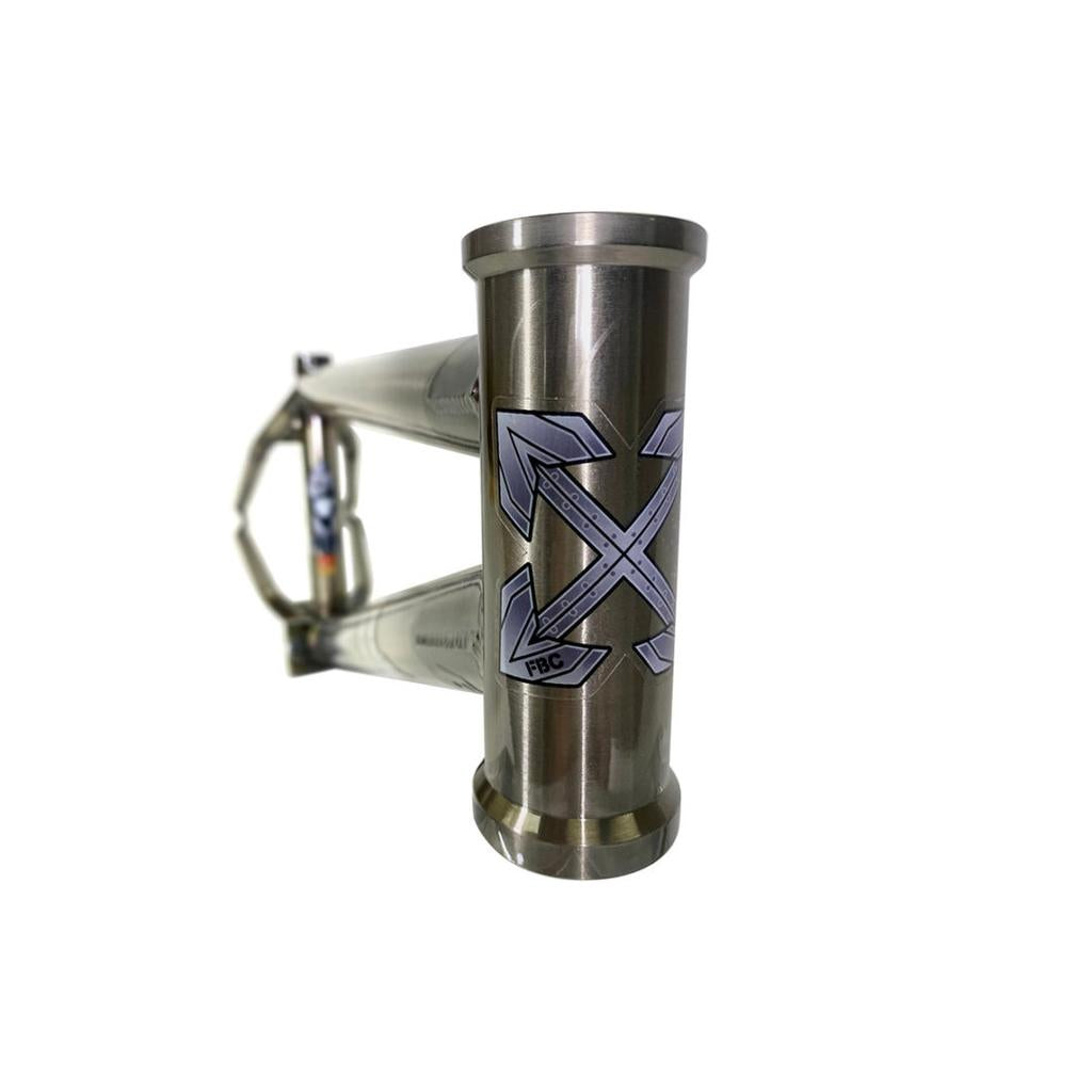 A close-up of a metallic Fit Bike Co Squib 18 Inch Frame shows the head tube with a logo of two crossed arrows and the letters "FBC.