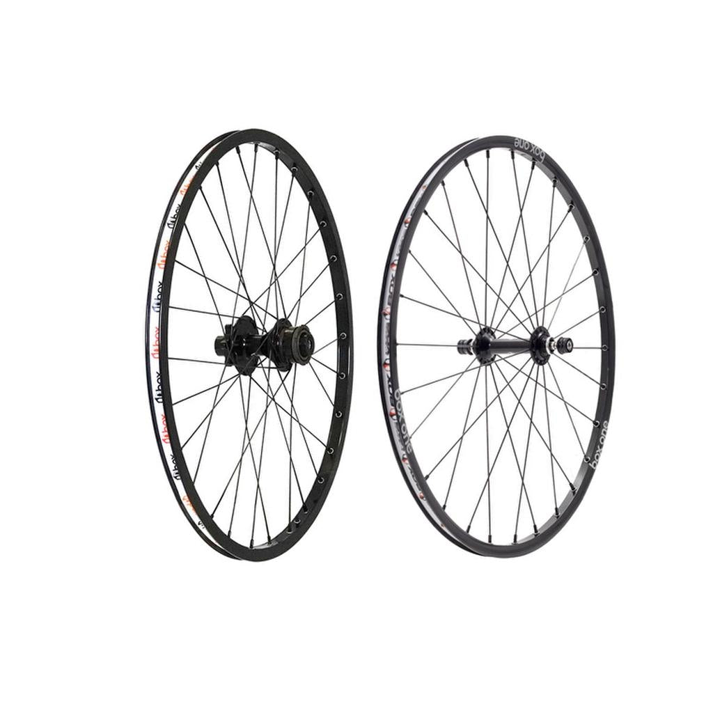 Two black bicycle wheels with spokes, one front and one rear, both featuring Box Three logos on the Expert Disc Wheel Set 28 Hole, displayed against a white background.