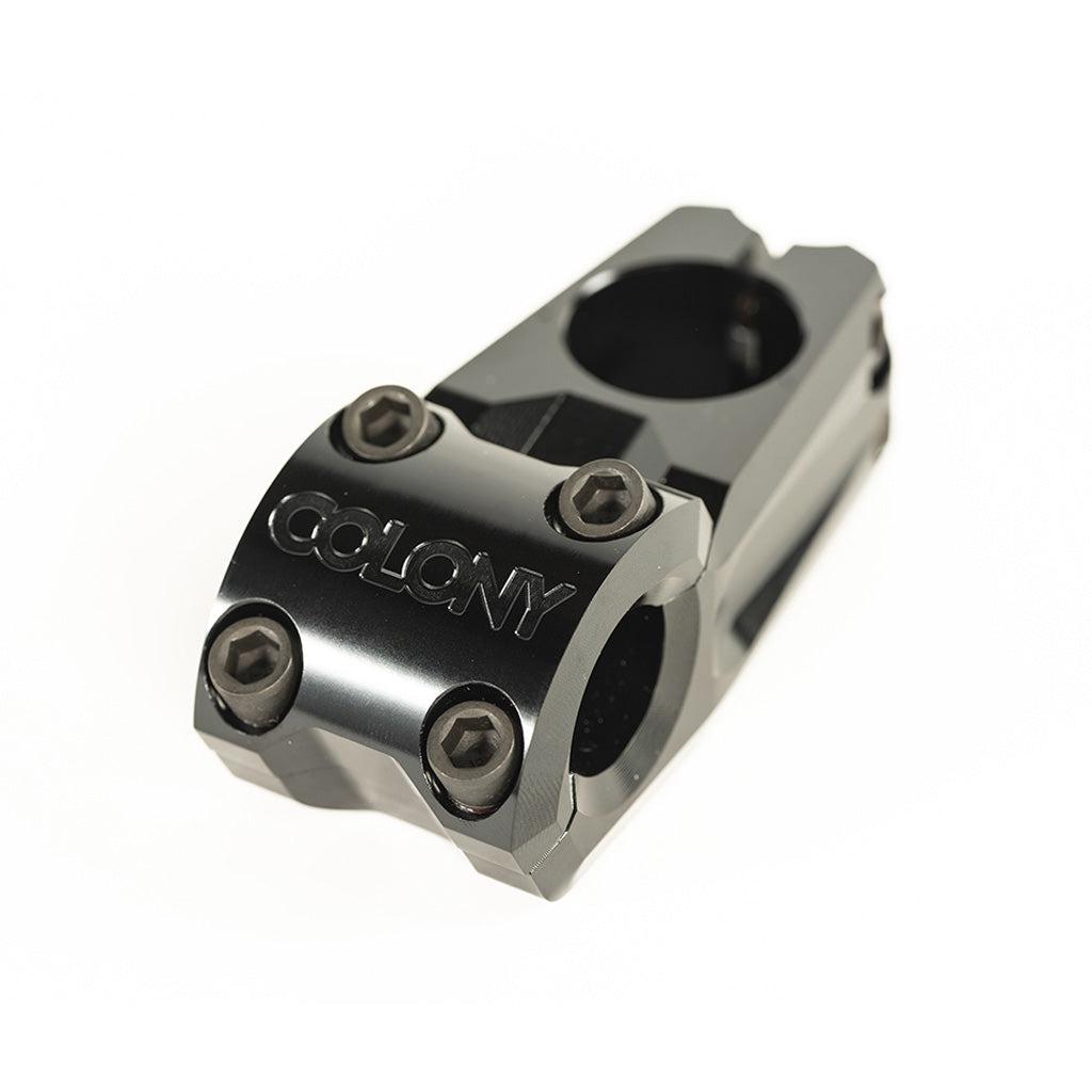 An image of a Colony Variant 52mm BMX Stem, a top load stem that offers a low-rise alternative for black bicycles.