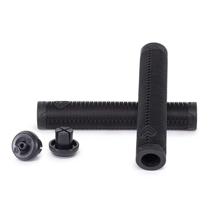 A pair of black rubber Eclat Shogun Grips on a white background.