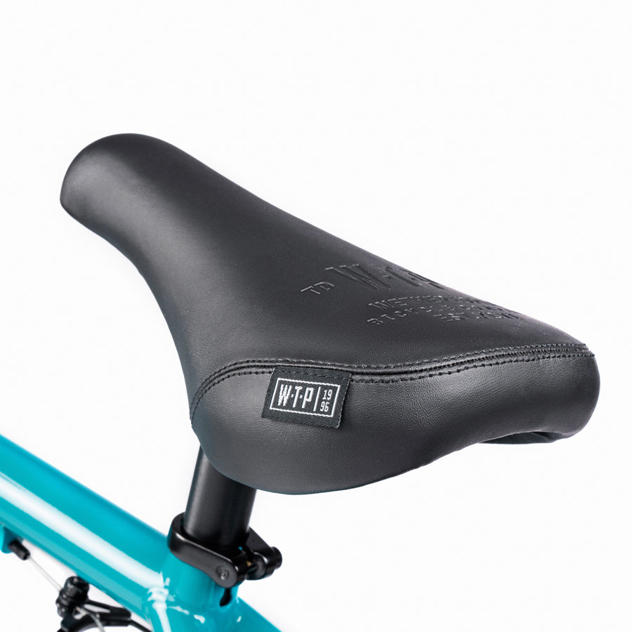 A close up of a Wethepeople Nova 20 Inch BMX Bike, an iconic blue BMX bike seat.