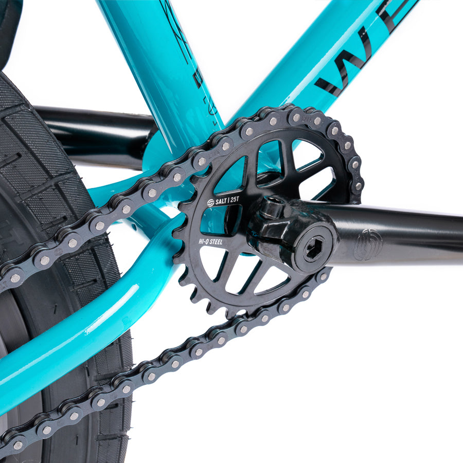 A close up of a vibrant Wethepeople Nova 20 Inch BMX Bike with a black chain. This best-selling Nova boasts colourways that are both stylish and eye-catching, and features the reliable stopping power of an Écl