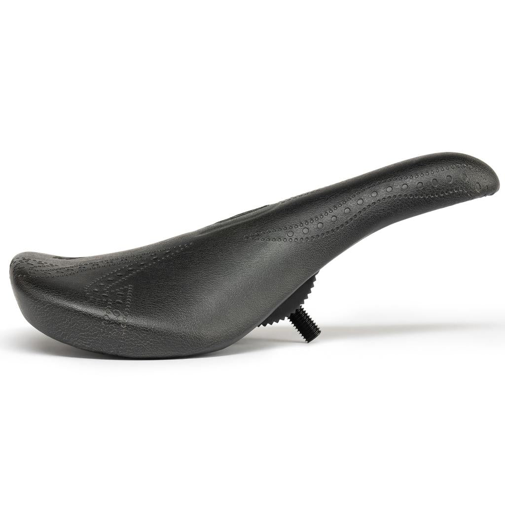 A black Eclat Exile Pivotal Seat / Tyson BMX seat with textured patterns is shown in profile against a white background, featuring a visible mounting bolt underneath.