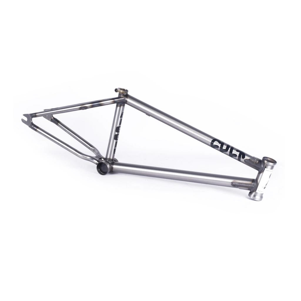 A Cult Biggie Frame (Devon Smilie Signature), featuring street-inspired geometry, stands without wheels, seat, or handlebars against a plain white background.