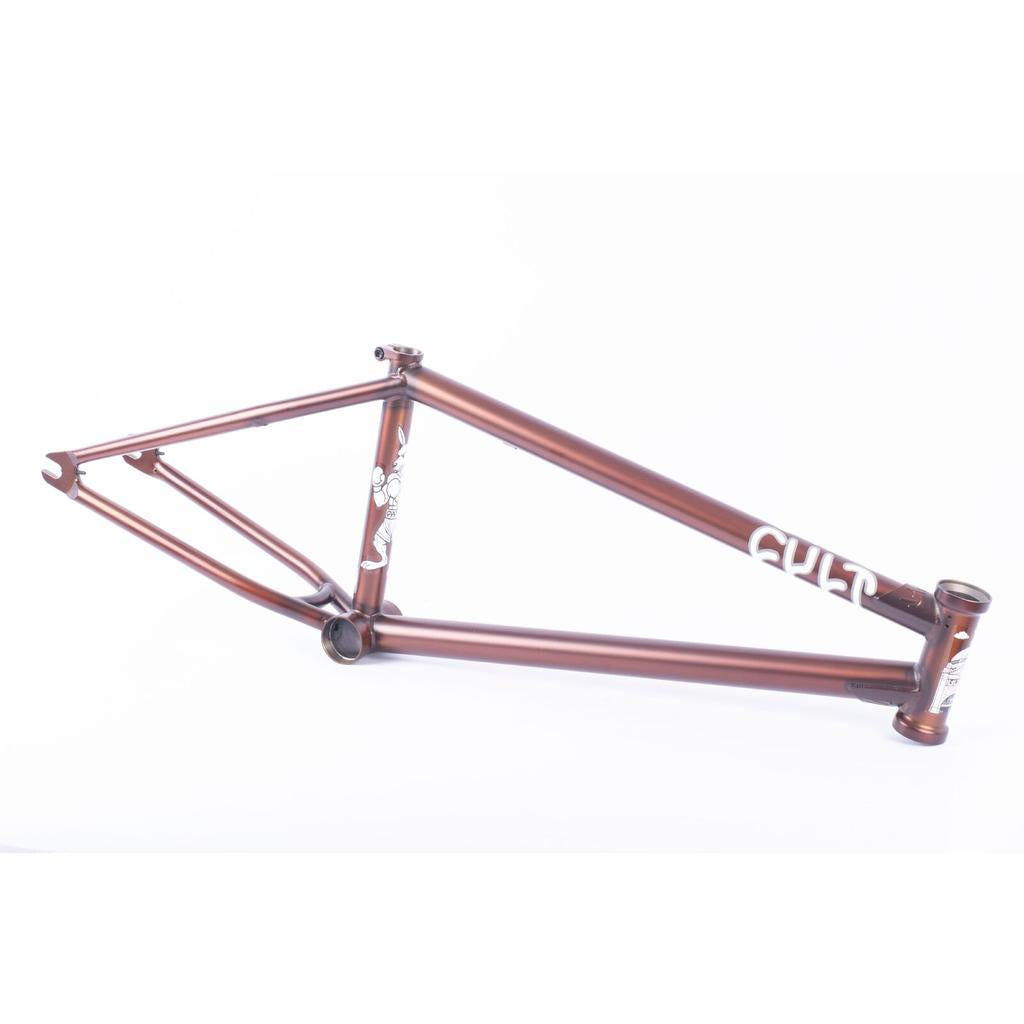 The Cult Dak Frame / Pat Freyne Signature is a brown BMX frame with "CULT" branding on the top tube and a graphic on the down tube, shown against a white background.