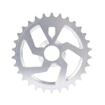 The Cult NWO Sprocket, shown in silver with 25 teeth and a geometric cutout design, is crafted from durable 7075-T6 aluminum and displayed against a white background.