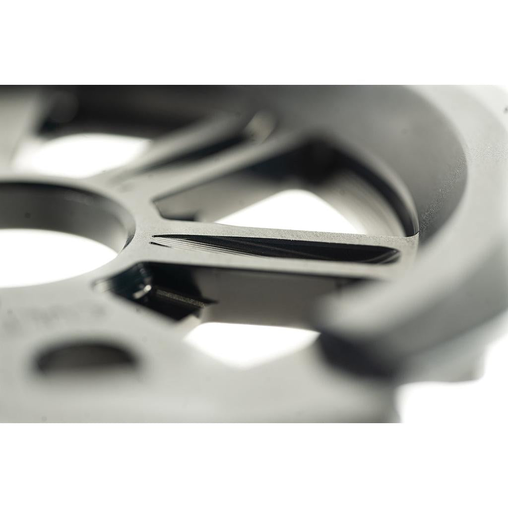 Close-up of the cult-dak-guard-sprocket featuring several spokes and a smooth, matte finish, crafted from durable 7075-T6 aluminium.