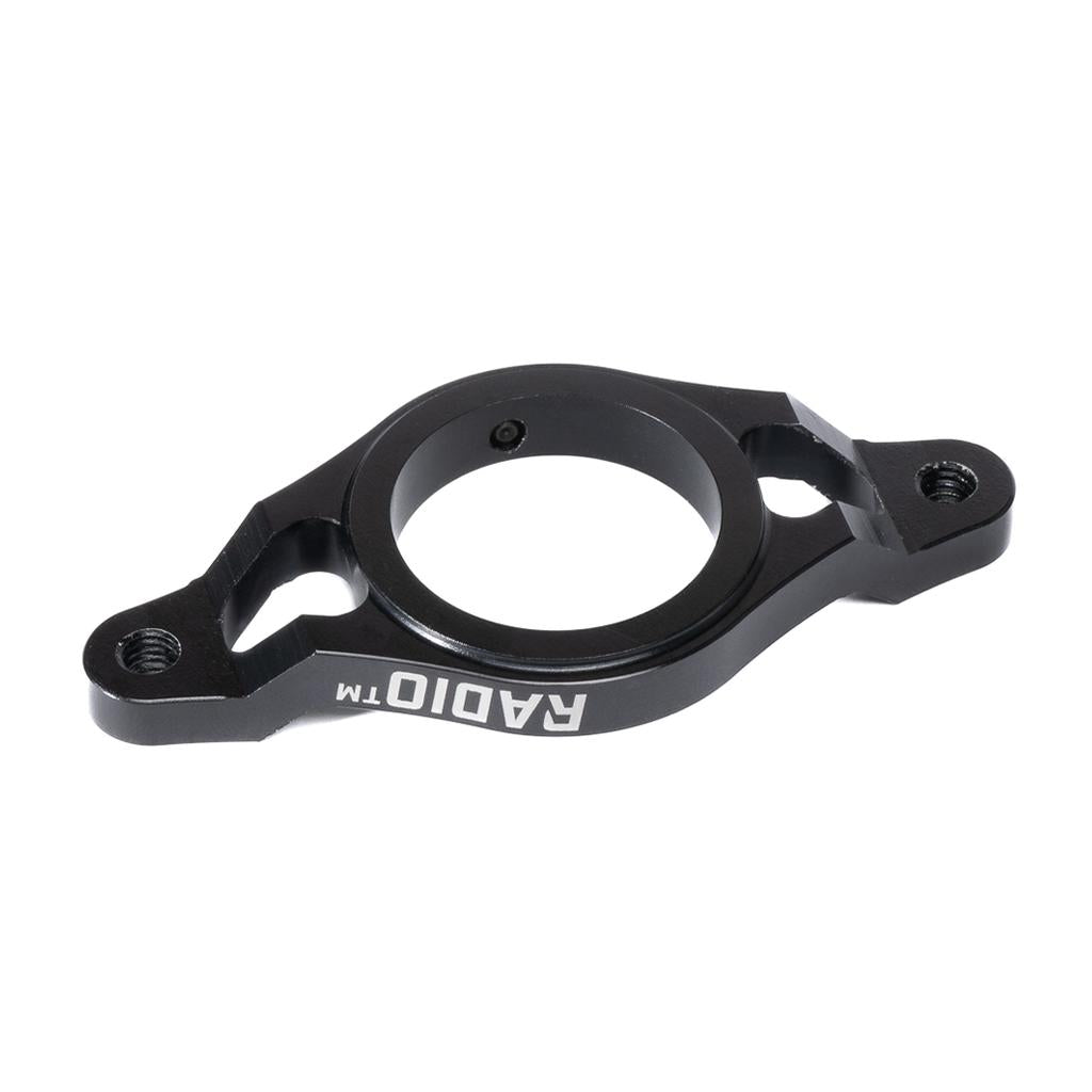 The Radio Aeon Gyro Rotor Plate is a black CNC-machined 6061-T6 alloy MTB gyro plate with two mounting holes and a central circular opening, featuring "RADIO TM" in white text—built strong for BMX rotor cable setups.