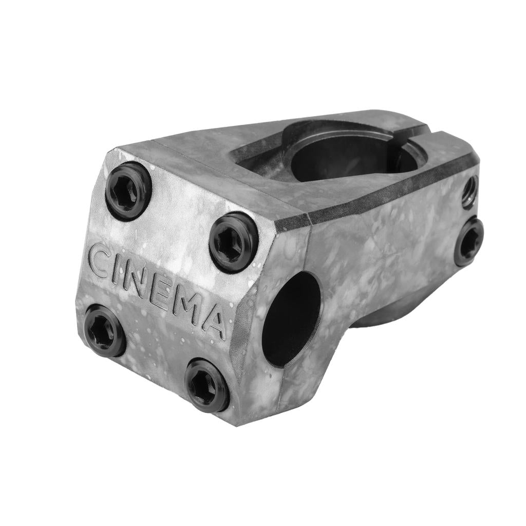 The Cinema Projector Stem is a metallic BMX stem with a marbled gray finish, "CINEMA" engraving, six visible hex bolts, and a 50mm reach for enhanced control and style.
