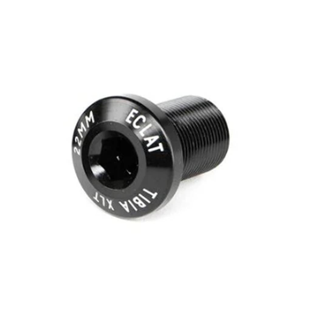 The Eclat Tibia XLT Crank Spindle Bolt is a black 22mm alloy replacement bolt with a hex socket and threaded body, featuring white text labeling on the head; designed for Tibia XLT cranks and shown against a white background.