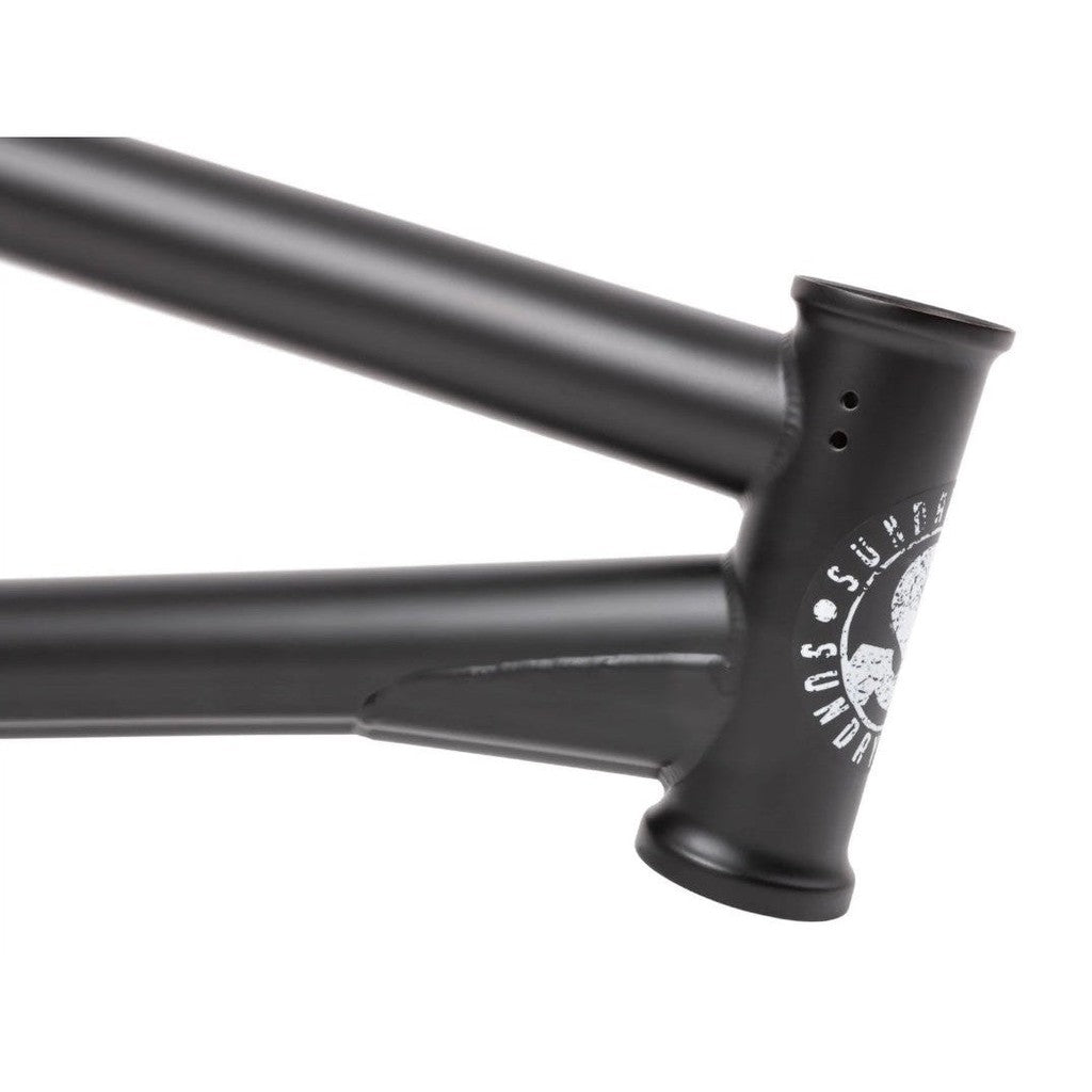 A black bike frame with a Sunday Wavelength Frame logo.