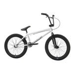 The Sunday Blueprint 20 inch Bike is a white beginner BMX with black handlebars, seat, and tires. Shown from the side against a plain background. Features Odyssey parts for reliable performance.