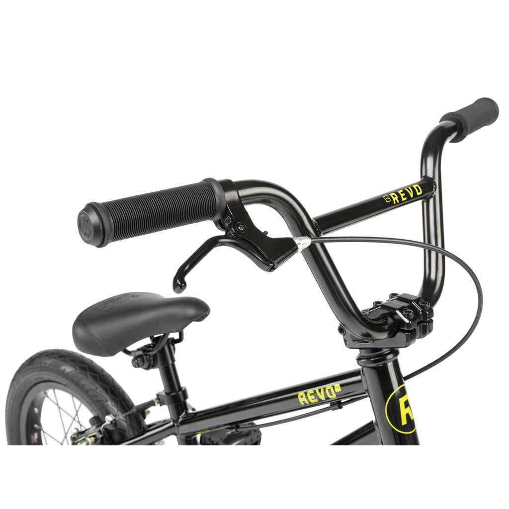 Close-up of a black Radio Revo 14 Inch bike handlebar with a brake lever and seat, featuring "REVO" in yellow on the frame and handlebar—a great choice for a first BMX bike.