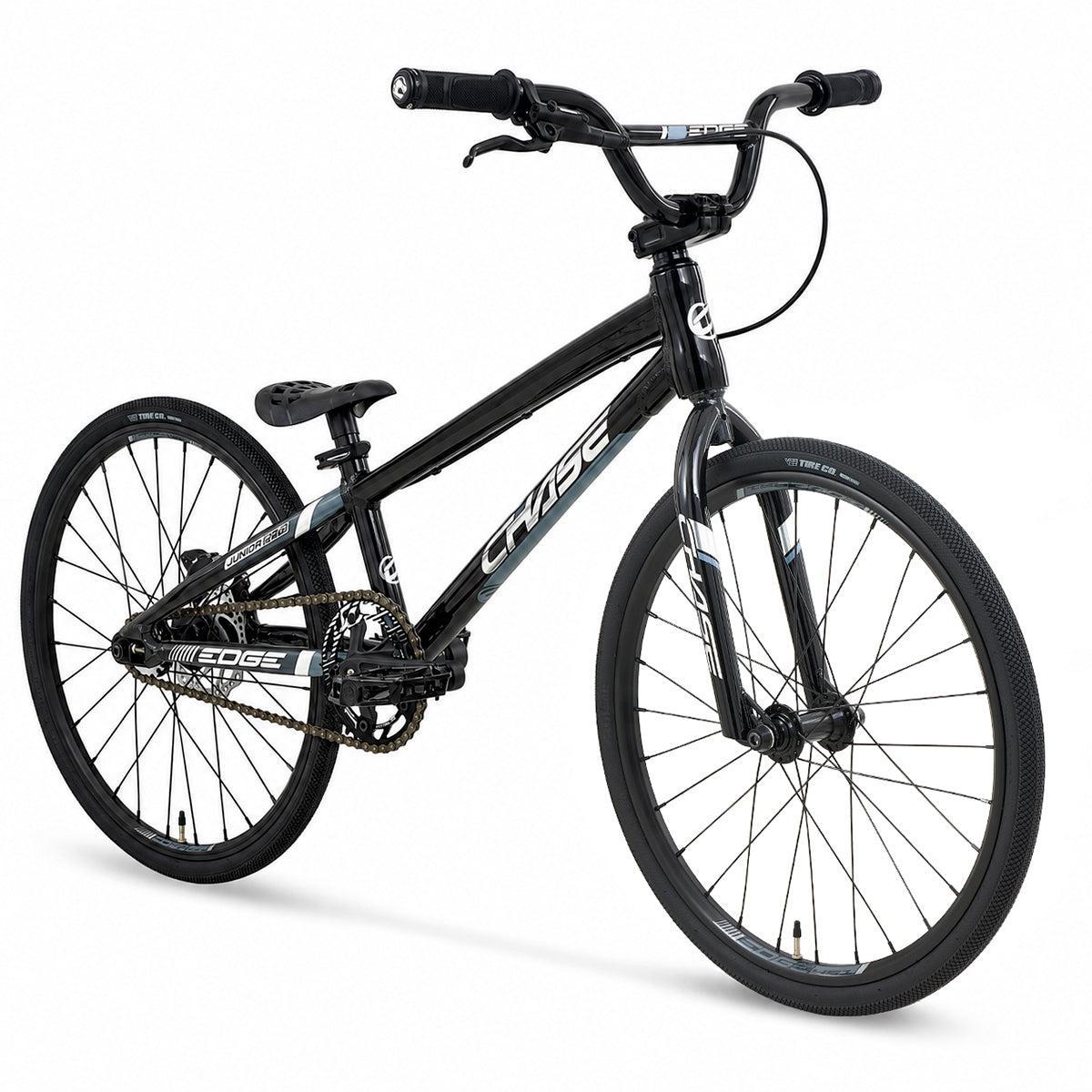 The Chase Edge Junior Race Bike (2027) features a hydroformed aluminum frame in black with “CHASE” printed on it, thin tires, a raised seat, straight handlebars, and an integrated head tube for a sleek design.