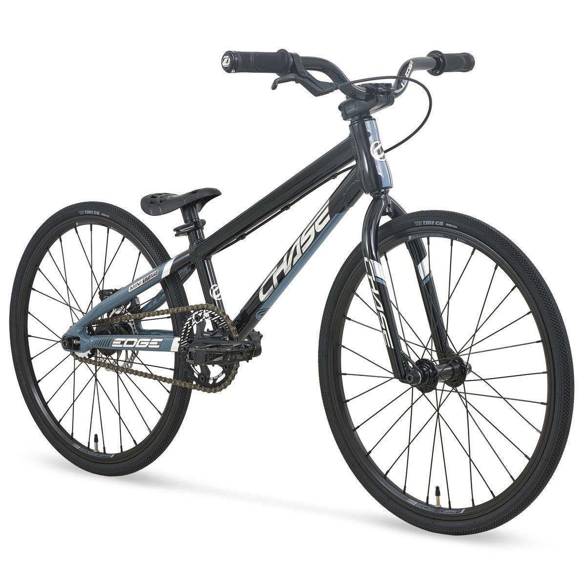 Chase Edge Mini Race Bike (2027) in black and gray, showcasing “CHASE” branding, features a lightweight 6061 aluminum frame, integrated head tube, flat handlebars, and large knobby tires designed for BMX racing.