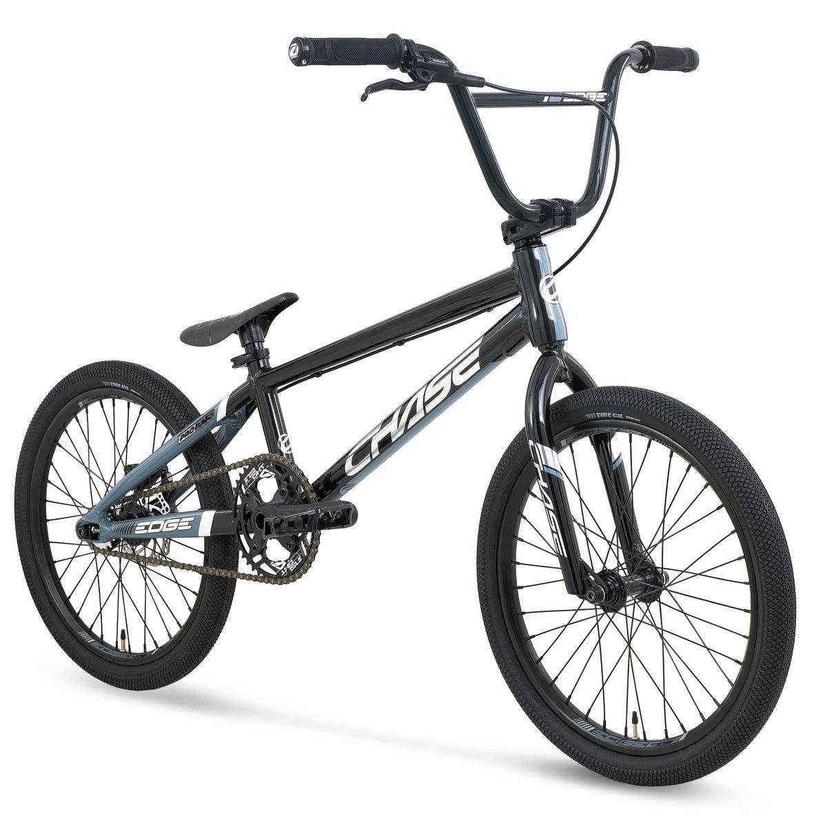 The Chase Edge Pro Race Bike (2027) is a black and gray BMX with thick tires, a padded seat, an integrated head tube, and “CHASE” branding on its hydroformed 6061 aluminum frame, shown on a white background.