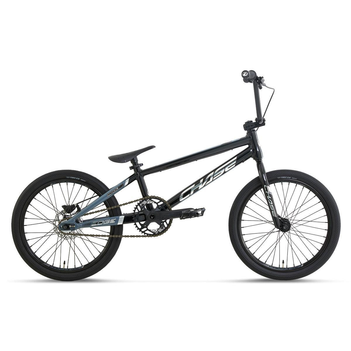 A Chase Edge Pro XXL Race Bike (2027) with a hydroformed 6061 aluminium Edge frame, black finish, compact design, 20-inch wheels, single gear, flat pedals, and a straight handlebar is displayed on a white background.