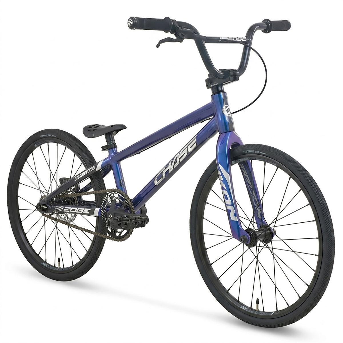 Chase Edge Expert CF Race Bike (2027) with a blue and purple gradient frame, black components, and spoked wheels.