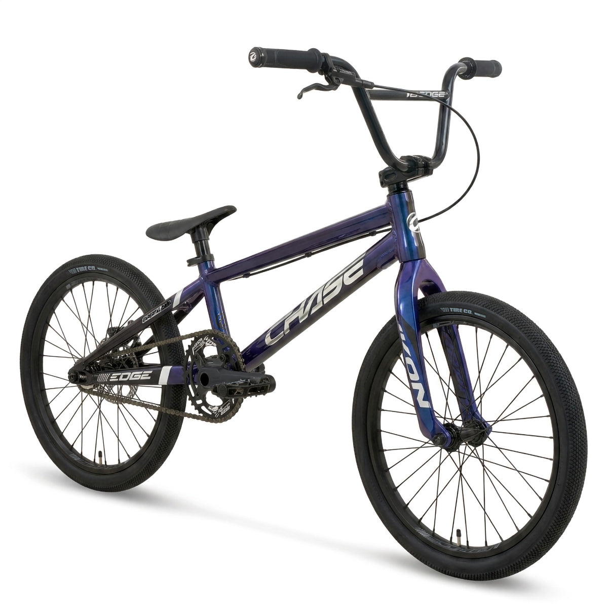 A blue Chase Edge Expert XL CF Race Bike (2027) with black tires, a straight handlebar, and a compact frame featuring a sleek carbon fork. The bike is positioned at an angle facing left.