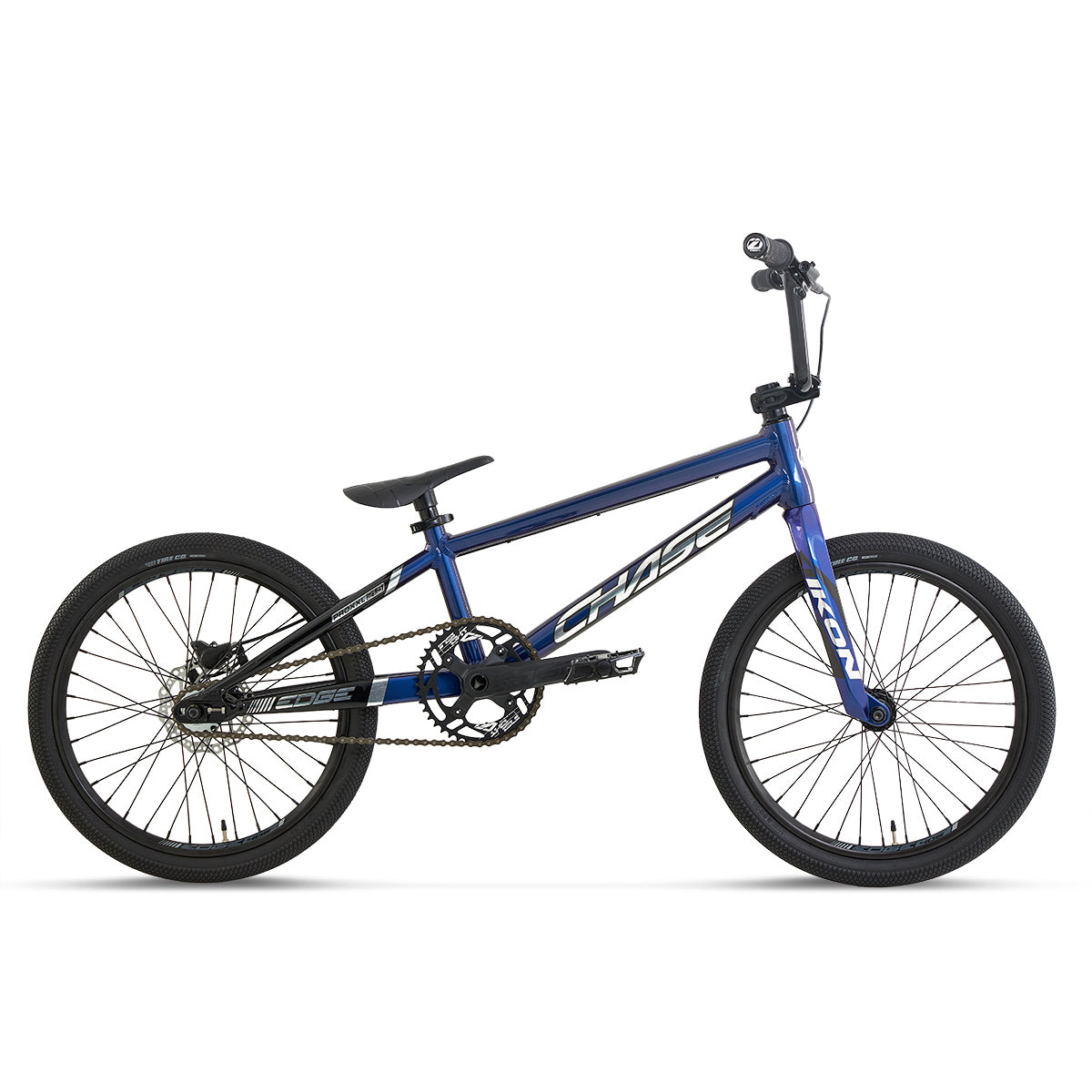 The Chase Edge Expert XL CF Race Bike (2027) is a blue BMX-style bicycle featuring a compact frame, single gear, straight handlebars, and black tires. Shown in profile against a white background, this model takes inspiration from the Chase Edge CF race bike and is equipped with a lightweight carbon fork to boost performance.